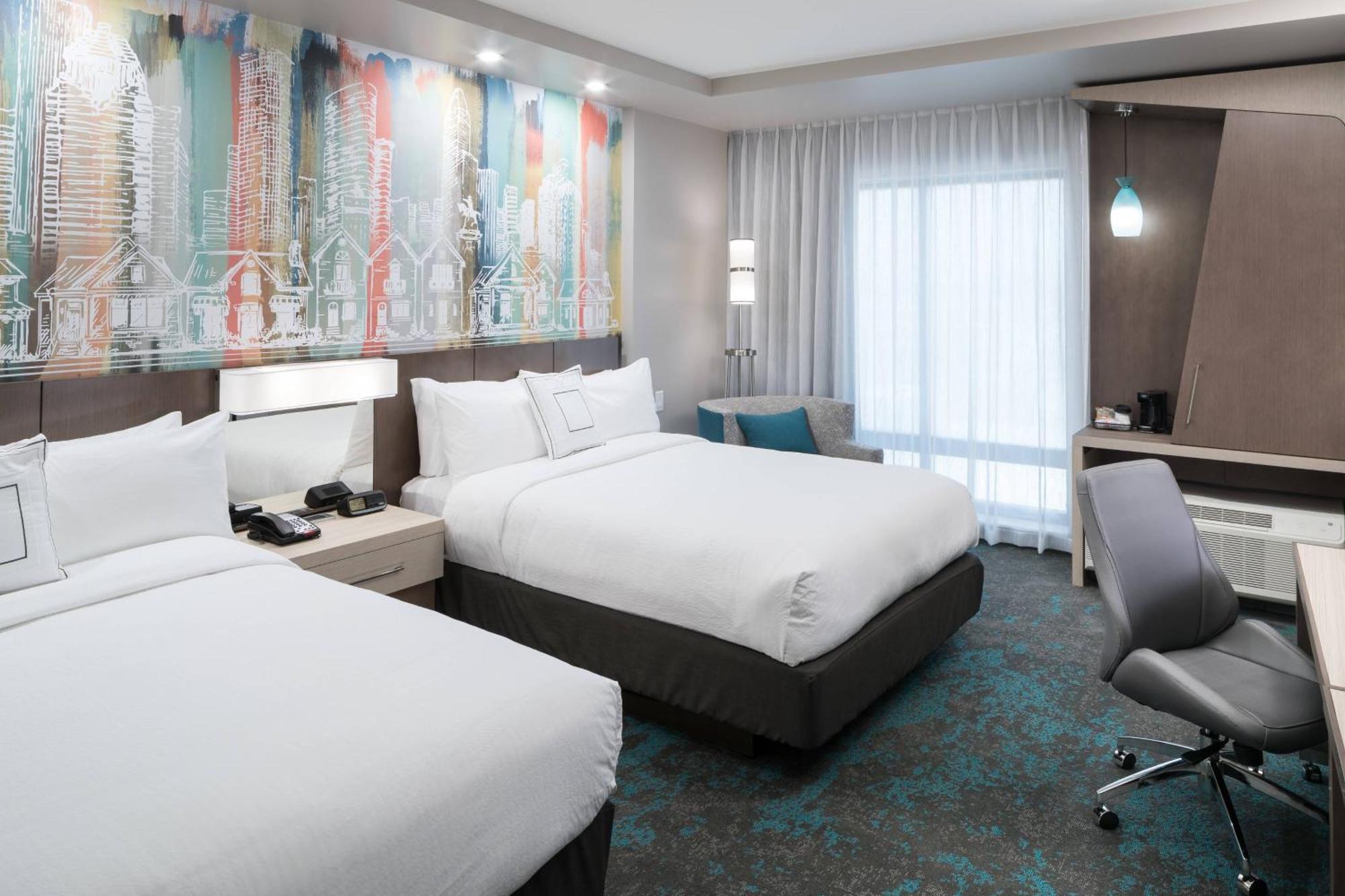 Queen Room Two Queen Beds Skyline View Hearing Accessible