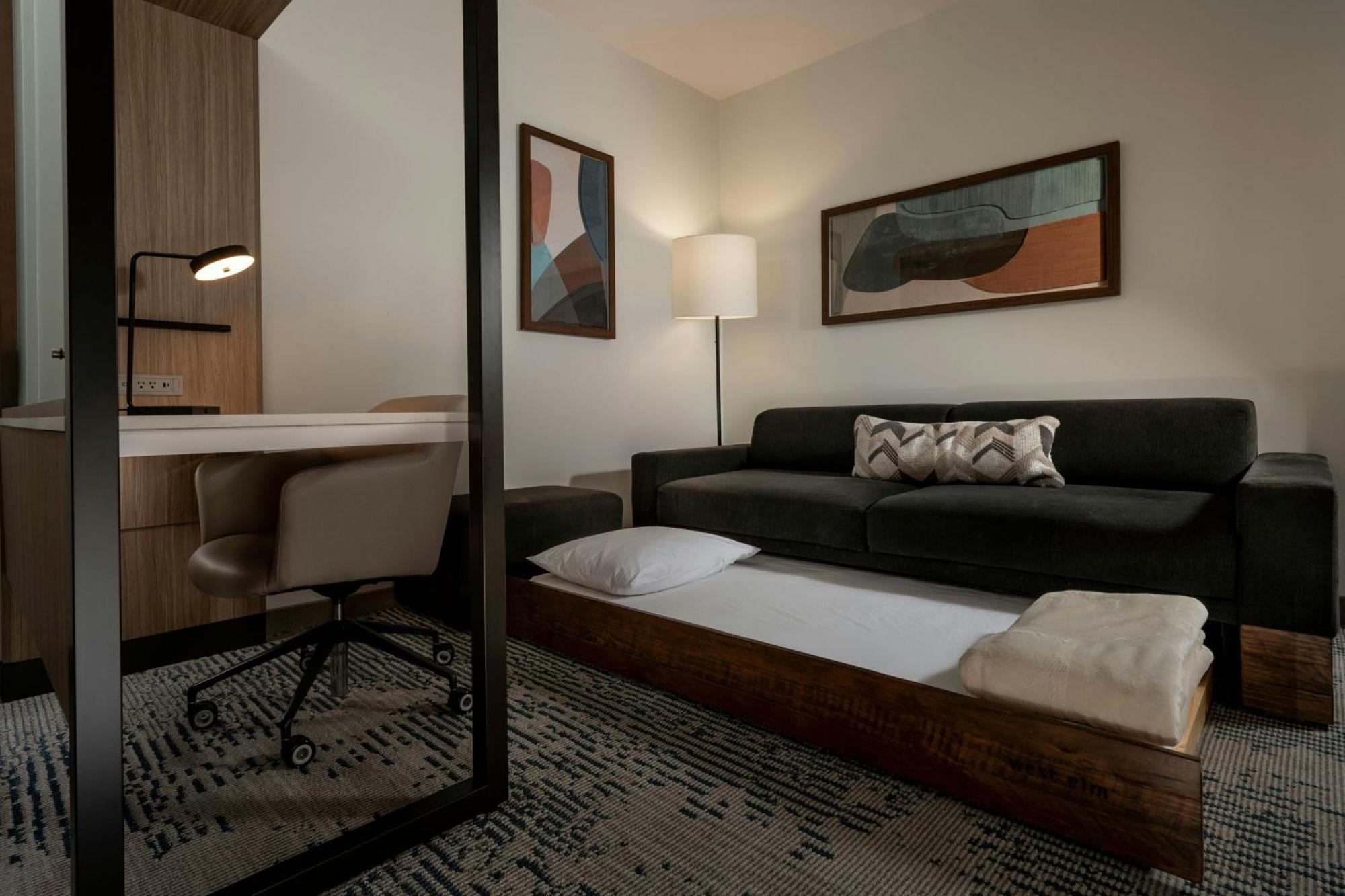 Queen Suite Two Queen Beds Roll Shower Transfer Shower Trundle Sofa Mobility Access or Hearing Accessible